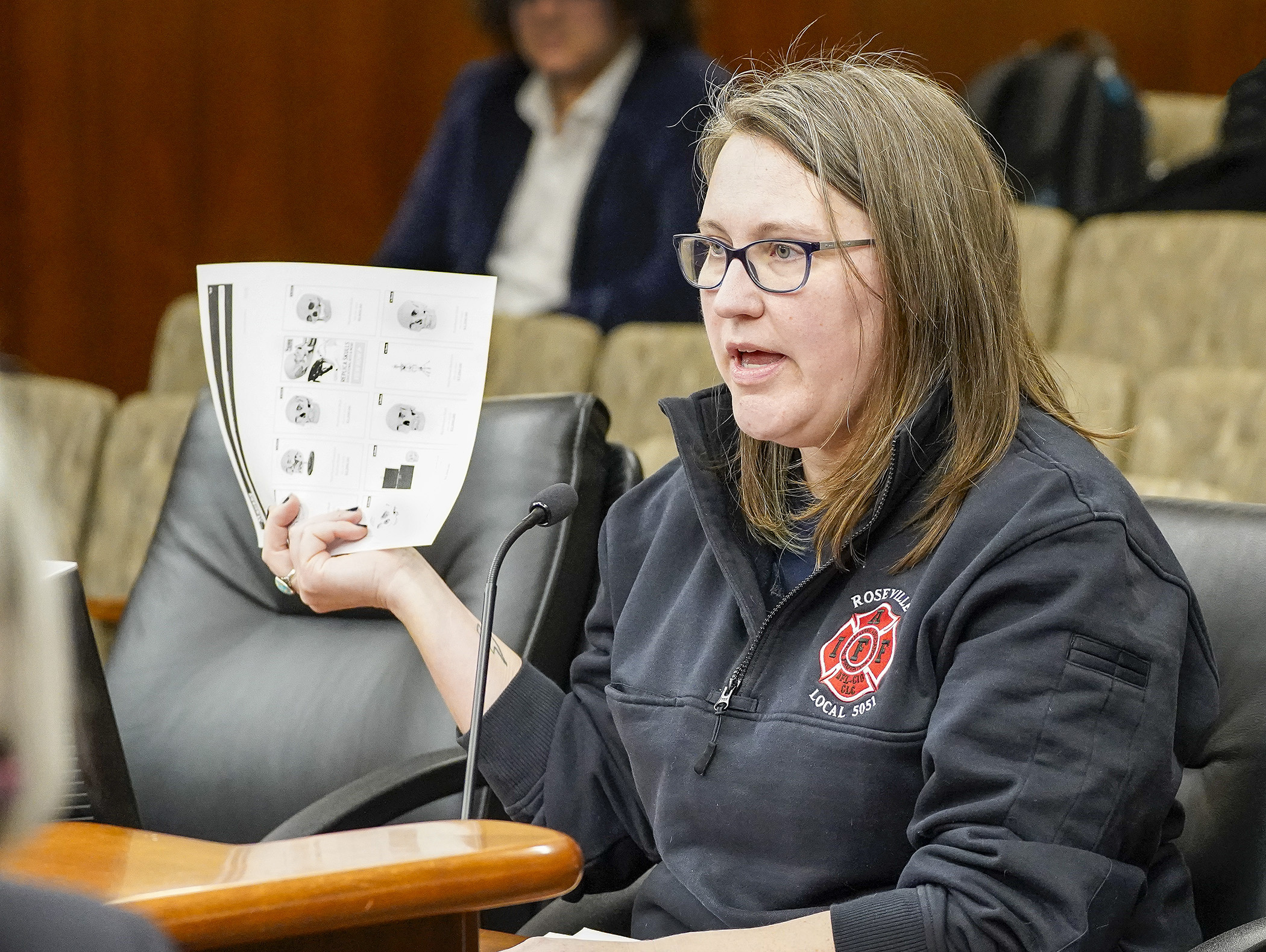 Rep. Jamie Becker-Finn testifies before the House Commerce Finance and Policy Committee Feb. 19 in support of a bill she sponsors that would prohibit the sale of calcified human remains for commercial purposes. (Photo by Andrew VonBank)